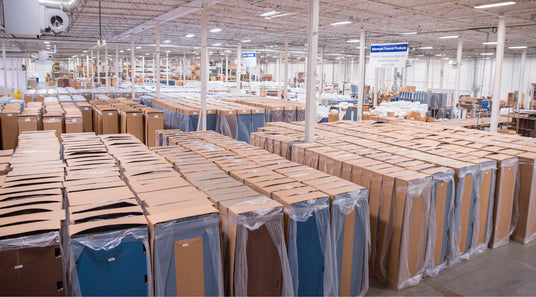 Wide view of Starmark's manufacturing floor filled with products.