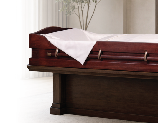 Bed Viewer Casket without lid on a casket stand in a funeral home