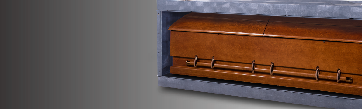 Wood casket inside a vault